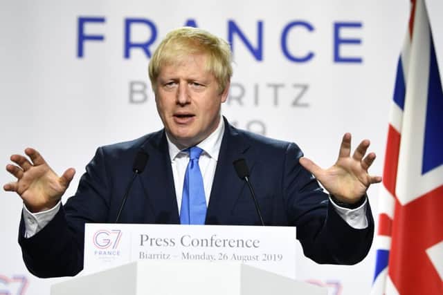 Summit: Boris Johnson addresses the G7 in Biarritz.