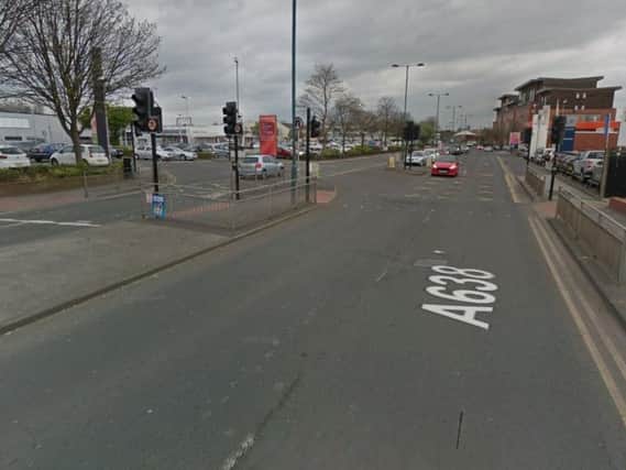 The 12-year-old was hit while crossing the road on Ings Road, just outside Halfords.