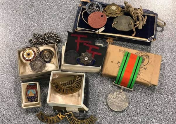 Police in Pontefract are trying to find the rightful owner of these medals.