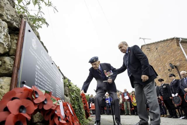 Ex-Halifax Bomber gunner Geoff Towers BEM lays a wreath at the memorial in Chapel Hill in Darrington.