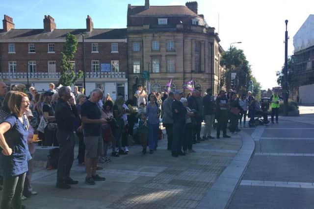 They gathered outside County Hall in Wakefield to listen to speeches, sing songs and raise awareness about protecting the planet.