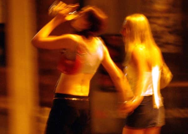 Girls drinking in the street in Preston Town Centre on saturday night 
BINGE / DRINK / ALCOHOL / DRUNK / STREETS / GIRLS