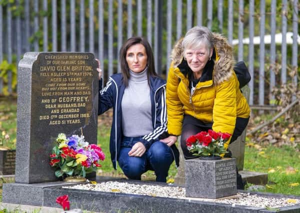 Claire Moffat and her mother Dawn Lifsey at the grave site.