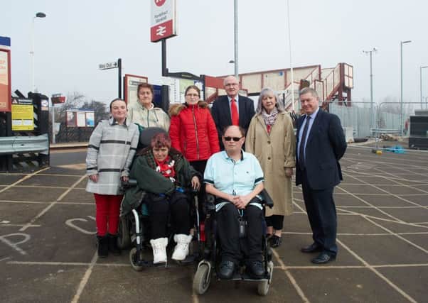 Wheelchair-bound Damon Nicholson is unable to use a platform at his local Pontefract Monkhill Station because there is no step-free access. Pictured with friends and local councillors, Clive Tennant, Pat Garbutt and David Jones.