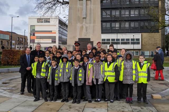 Pupils from Pinders Primary, Wakefield, also attended the service at the War Memorial this morning.