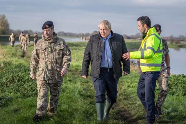 PM Boris Johnson visited South Yorkshire on Wednesday, but has been criticised for not declaring a national emergency after the floods.