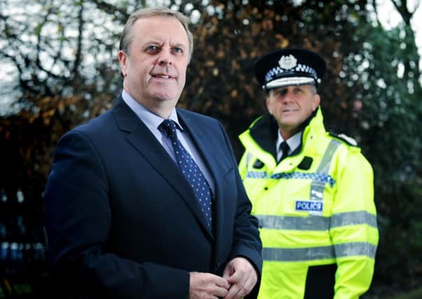 West Yorkshire's Police and Crime Commissioner Mark Burns-Williamson with the temporary Chief Constable of West Yorkshire Police John Parkinson.