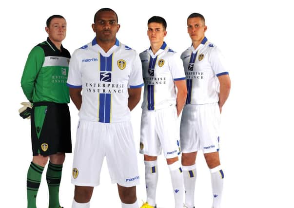 Leeds United players model the new kit.