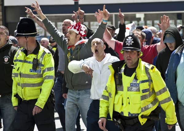 TERROR TARGET The English Defence League demonstation in Dewsbury town centre last June.