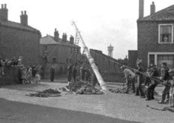 Gawthorpe Maypole being put up in 1953.