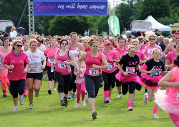 22nd July 2012. Race For Life at Pontefract Racecourse. Runners set off from the start.
