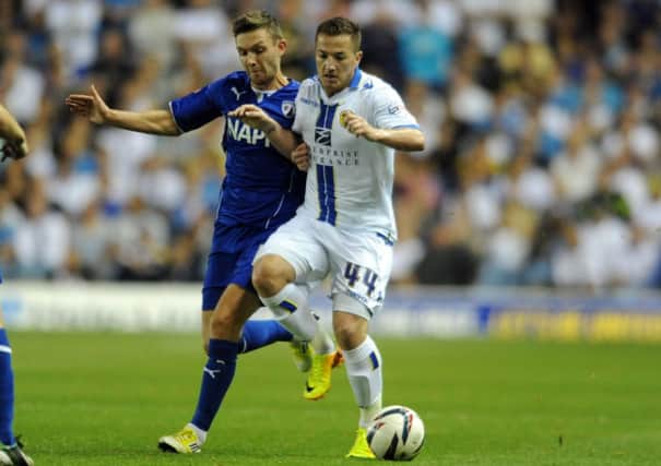 Ross McCormack shrugs off Chesterfield's Jay O'Shea during last night's first round Capital One Cup tie.