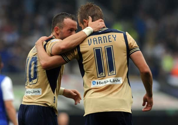 Leeds United's Noel Hunt celebrates with Luke Varney after he scored the first goal for Leeds United at Ipswich.