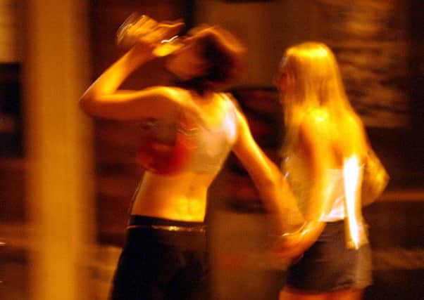 Girls drinking in the street