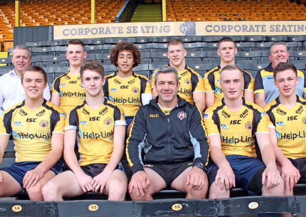 Castleford Tigers academy signings. Front row: Lee Alderson, James Brown, Daryl Powell (Tigers head coach), Nathanial Callaghan, Daniel Sowerby. Back row: Steve Gill (CEO), Brandon Douglas, Niadh Currie-Clark, Brad Day, Brandon Westerman, Richard Tunningley (departing head of youth development). Missing from the picture is Ryan Westerman and Will Maher.