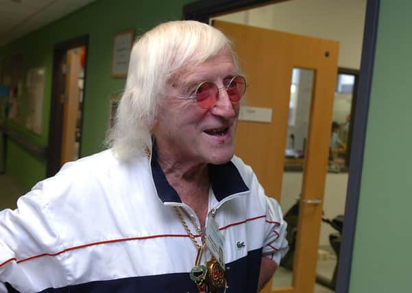 Savile at the opening of the new spinal injuries rehabilitation centre at Pinderfields Hospital in 2010.