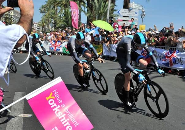 Chris Froome leads Team Sky round 'Cragg Vale' corner in the Tour de France stage 4 Team Time Trial in Nice.