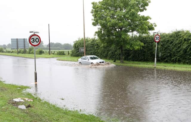 Flooding on Denby Dale Road at Junction 39 of the M1