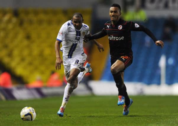 Rodolph Austin and Jordan Obita chase the ball during Leeds United's game against Reading. Picture: Bruce Rollinson