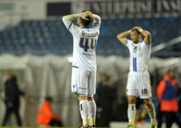 Ross McCormack and Noel Hunt look dejected at full-time of Leeds United's game against Charlton.