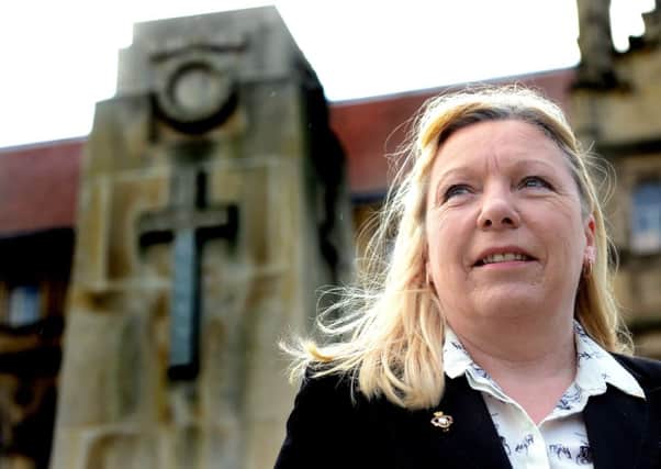 Sandra Pickin: New veteran's champion, pictured by the war memorial in Wakefield city centre.w303a306
