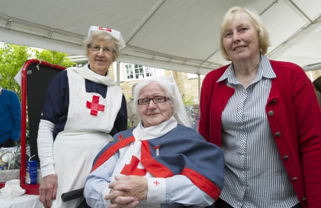 Picture by Allan McKenzie/AMGP.co.uk - Press - Ackworth Village Green Fayre - Ackworth Village Green, Ackworth, England - 010614 - Judith Rooke & Betty Johnson of the Pontefract & Ackworth British Legion with Carol Smith.