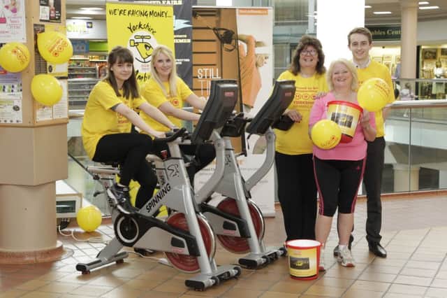 The Ridings shopping centre staff and retailers are cycling 118 miles on exercise bikes to raise money for the Yorkshire Air Ambulance.
On Bikes - Milly Smith and Vicky Clapham
Lynne Thompson, Daniel Carr and Eileen Holroyd