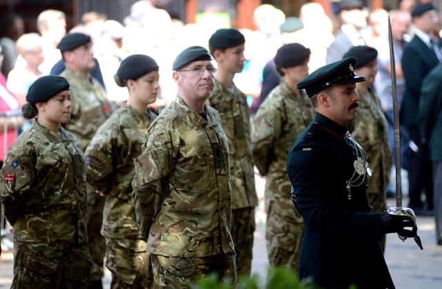 British army regiment, The Rifles, who were given the freedom of the city (Wakefield) during 2010, hold a parade in from of the cathedral.
w305t428