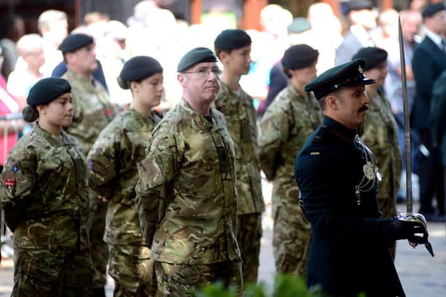 British army regiment, The Rifles, who were given the freedom of the city (Wakefield) during 2010, hold a parade in from of the cathedral.
w305t428