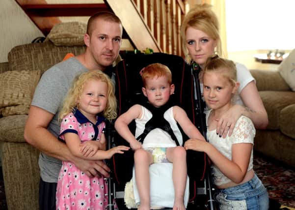 Little John Michalowski from South Elmsall, was left seriously injured after a car crash in which his father and two sisters were also injured.
Pictured: John with his mother & father, Igor and Katy, and sisters Alicia & Leah.
h309a429