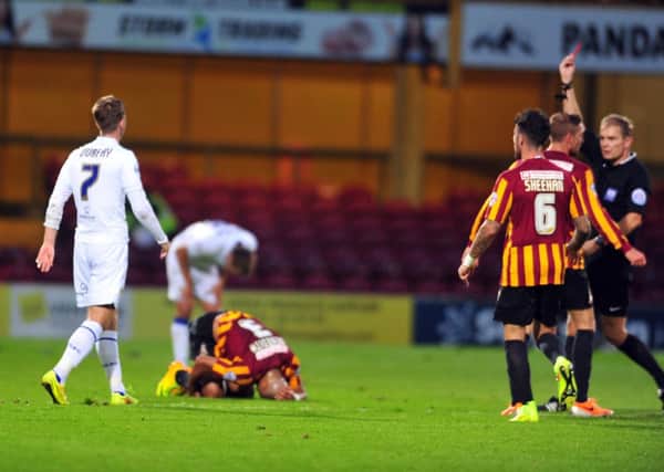 Leeds United's Luke Murphy is sent-off against Bradford City after a challenge on James Meridith. Picture: Tony Johnson