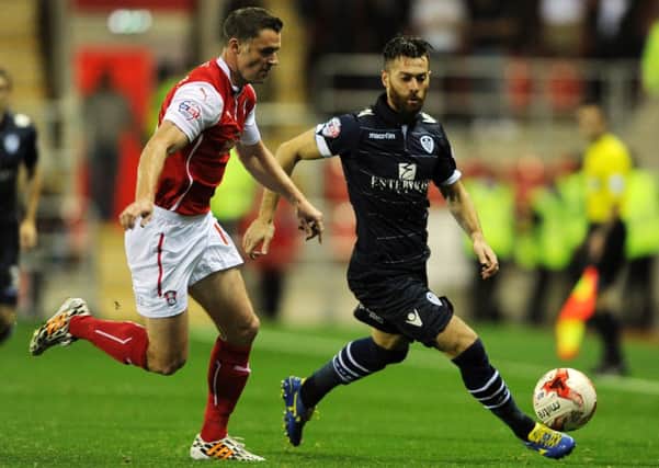 Goal scorer Mirco Antenucci up against former Leeds United player Frazer Richardson in the Yorkshire derby at Rotherham. Picture: Bruce Rollinson