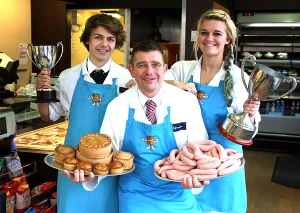 Nigel Hofmann and his son Harry & daughter Emilyfrom Hofmanns Butcher's have been crowned Yorkshire's supreme sausage champions. They also won prizes for their pork pies.