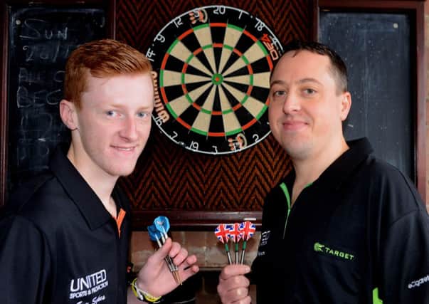 Darren Weaver and Tom Sykes will compete for a place in the Professional Darts Corporation this week.  (p603b502)