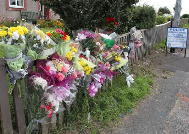 Floral tributes for Julie Shaw at Santingley Lane, Crofton