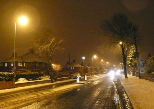 Traffic makes it's way down Kingsway, Ossett after overnight snowfall. Wednesday January 21, 2015