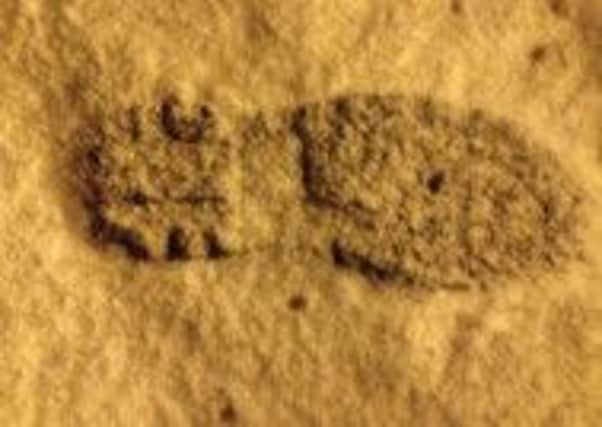 A suspected car criminal was arrested after police traced his footprints in the snow