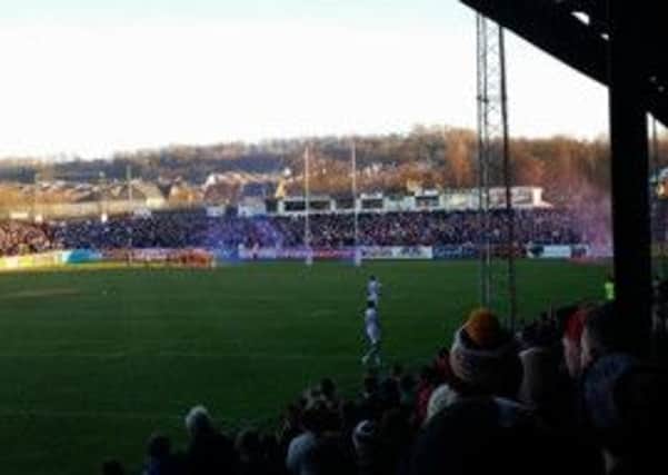 Flares thrown by Wakefield Trinity Wildcats fans onto the pitch during their match at Castleford Tigers.