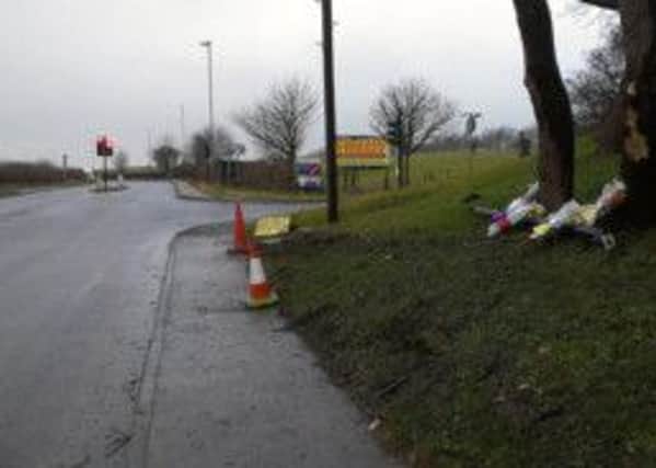 Floral tributes have been left at the scene of the accident