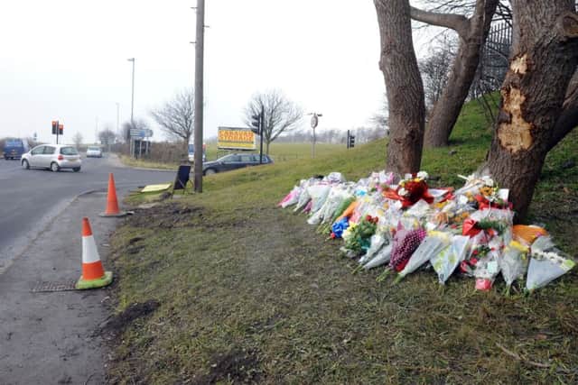 Flowers at scene of crash at Wakefield road, Nr Featherstone
