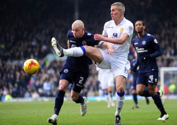 Leeds United striker Steve Morison is challenged by Millwall's Alan Dunne. Picture: Simon Hulme