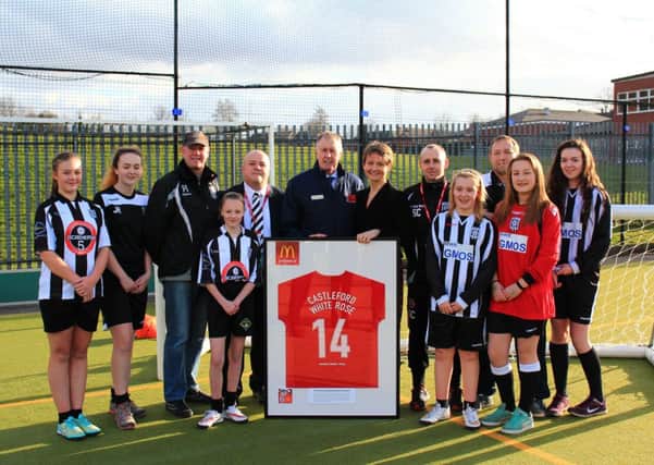 Sir Geoff Hurst with members of Castleford White Rose Ladies FC at Castelford Academy. Picture: JANE CARTER