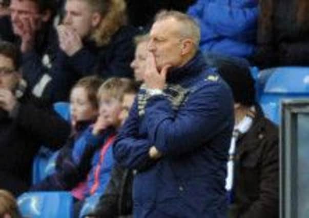Neil Redfearn deep in thought during last Saturday's game against Watford.