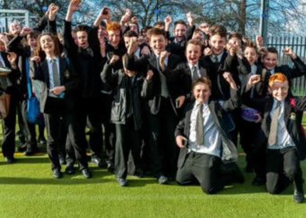 Castleford Academy pupils celebrating the visit of world cup winner Sir Geoff Hurst