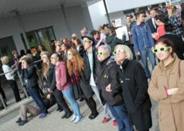 Pupils and teachers gathered at Wakefield College to watch solar eclipse