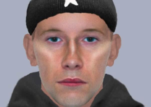 E-fit of a man police want to speak to in connection with an attempted robbery
