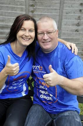 Robert and Paula Maguire of Ryhill near Wakefield give the thumbs up after completing the ice bucket challenge to raise funds for a Motor Neurone Disease charity