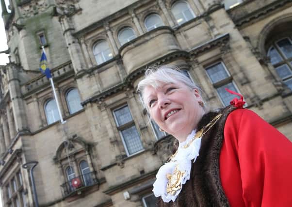Wakefield Mayor Sandra Pickin raising the flag for Commonwealth Day at County Hall, Wakefield