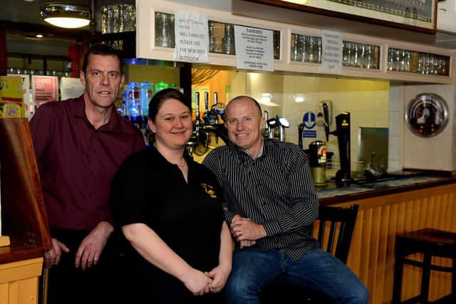 Black Swan manager Paul Geeson, left, staff member Natalie Worrell and pub owner Wayne Pickup.