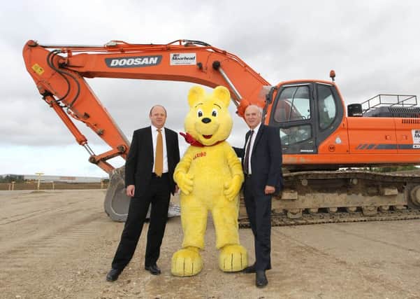 Vince Cable, former business secretary, pictured with Herwig Vennekens, managing director of Haribo, during a visit to the site in 2013.